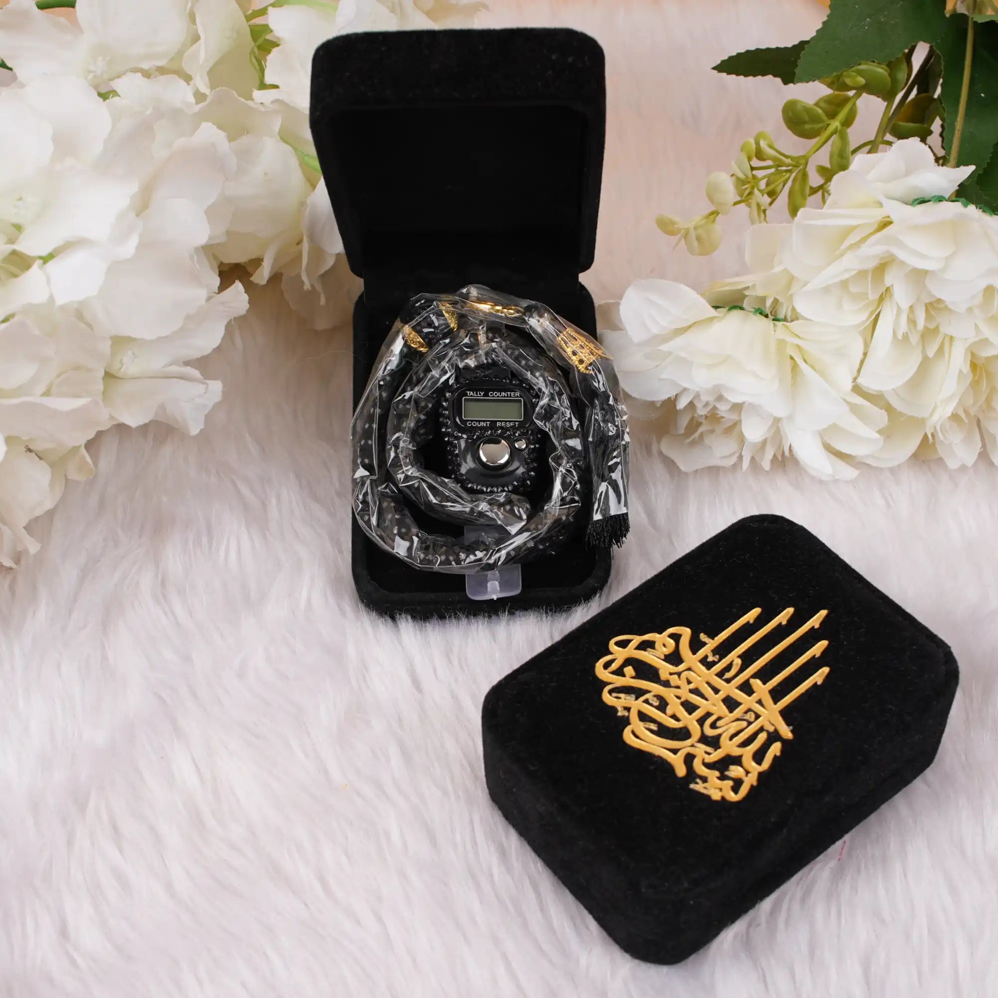 Velvet Tasbeeh Combo featuring a digital counter and black pearl prayer beads in a luxurious black velvet box with golden Islamic calligraphy. Main image