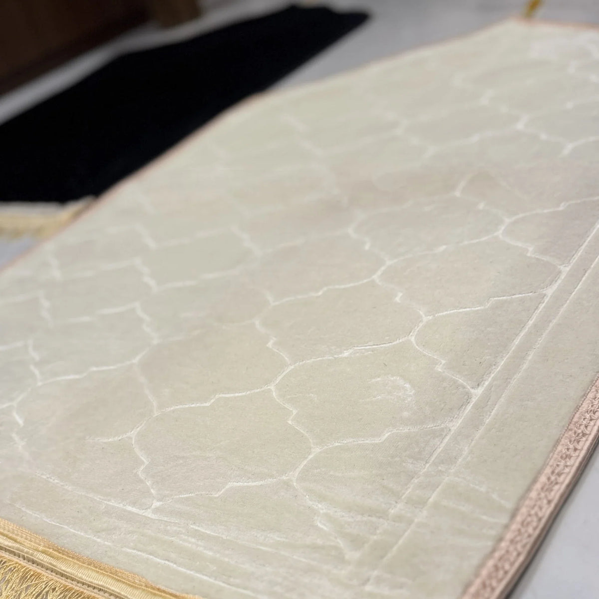 Close-up of white dome-shaped janamaz from Couple Prayer Mat set, showcasing soft textured fabric and elegant Islamic design.