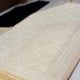 Close-up of white dome-shaped janamaz from Couple Prayer Mat set, showcasing soft textured fabric and elegant Islamic design.