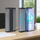 Wireless charging pad with smartphone on a desk