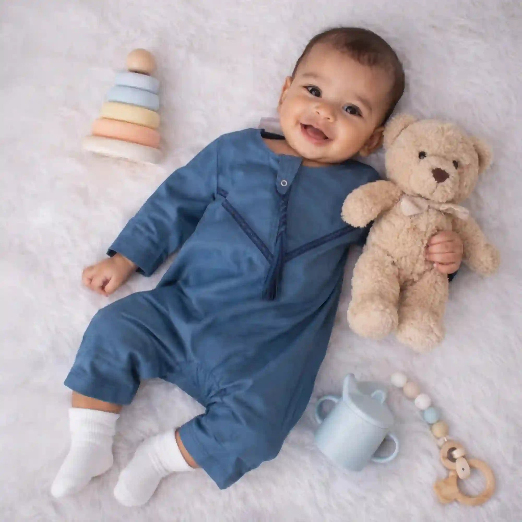 Blue Thobe Romper for Baby Boys in Omani style with tassel detail, ideal for EID. Soft fabric baby outfit from Kids Islamic Wear collection. Main image