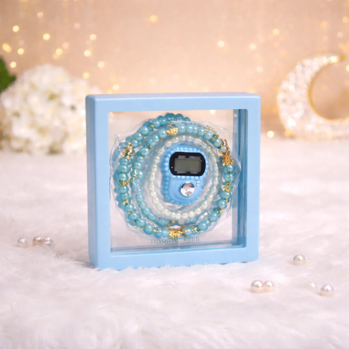 Light blue Transparent Tasbeeh Combo Favor containing a 100-bead pearl tasbeeh and a matching digital counter inside a clear square PVC box."