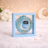 Light blue Transparent Tasbeeh Combo Favor containing a 100-bead pearl tasbeeh and a matching digital counter inside a clear square PVC box."
