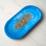 Blue Multi-Purpose Designer Trinket Tray with gold flakes, perfect for organizing keys or jewelry, adds a luxurious touch to home decor.