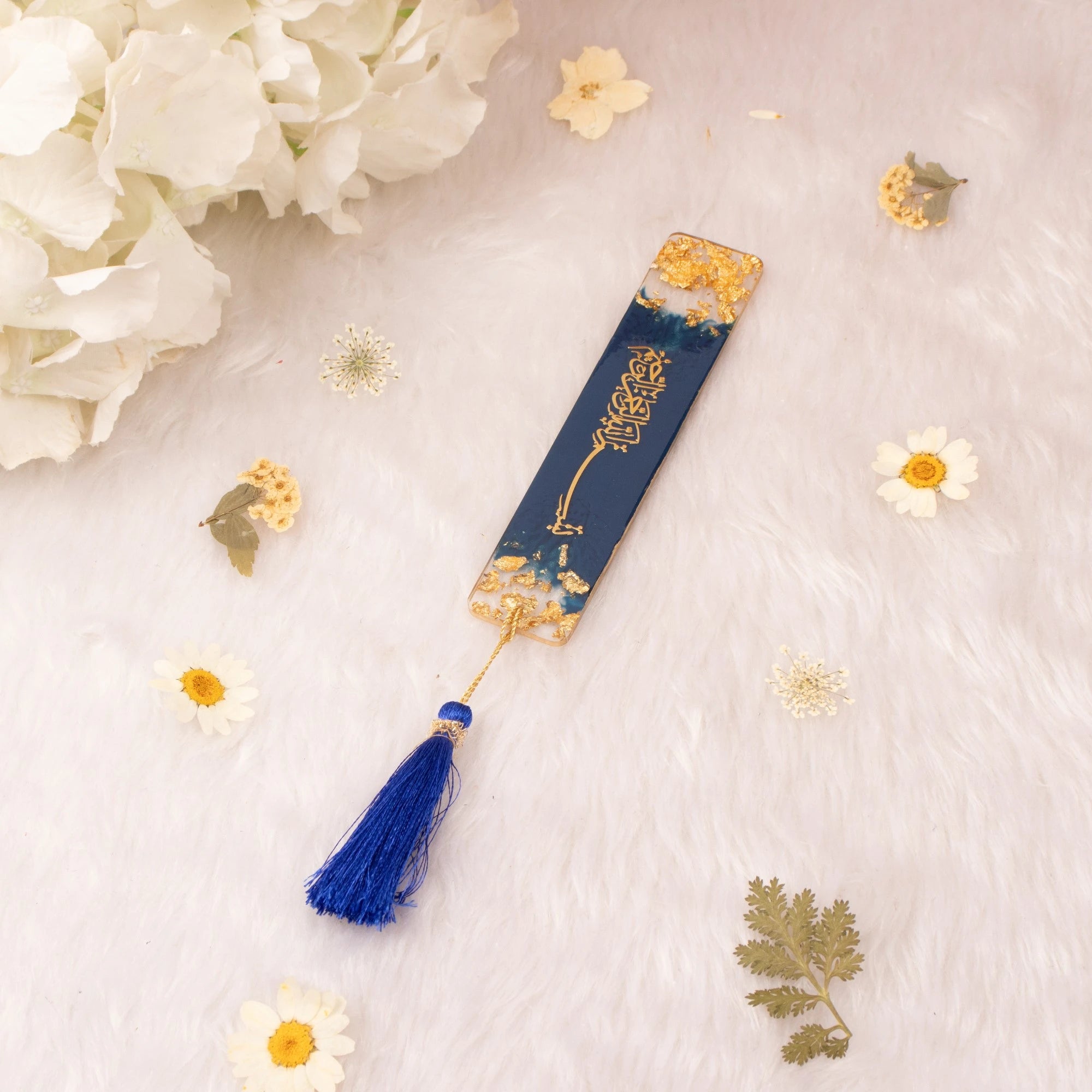 Islamic personalized bookmark in navy blue with golden calligraphy and blue tassel, ideal as elegant wedding favor or gift for sacred texts. Main image