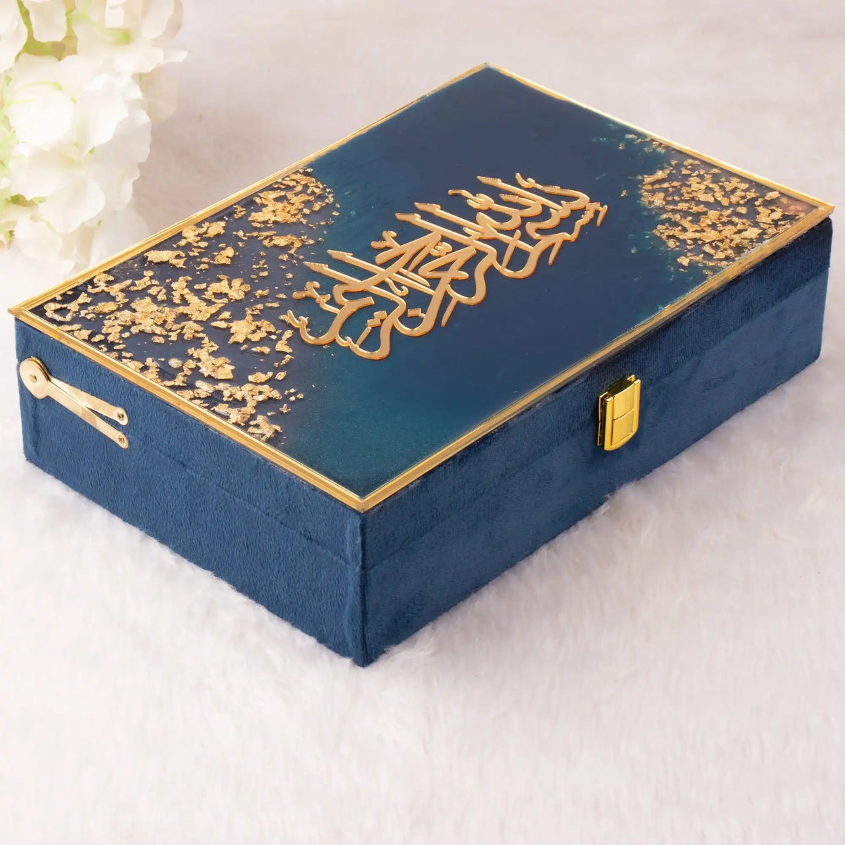 Luxury Blue Flakes Tilawat-e-Quran gift box with gold Arabic calligraphy and clasp, designed for ceremonial and religious gifting.