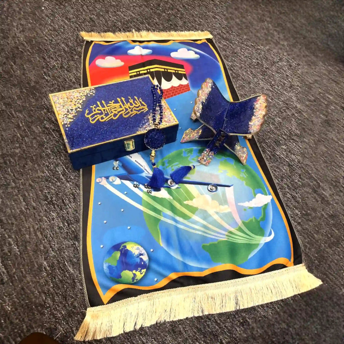Blue Kids Sawab-e-Jariya Hamper featuring Quran gift box, prayer mat with Kaaba design, glitter stand, and tasbeeh. Inspires Islamic learning.