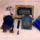 Premium Quran gift set with blue velvet cover, crystal tasbeeh, gold-accented box, and rehal stand from the Bridal Gifting Sawab-e-Jariya Hamper.