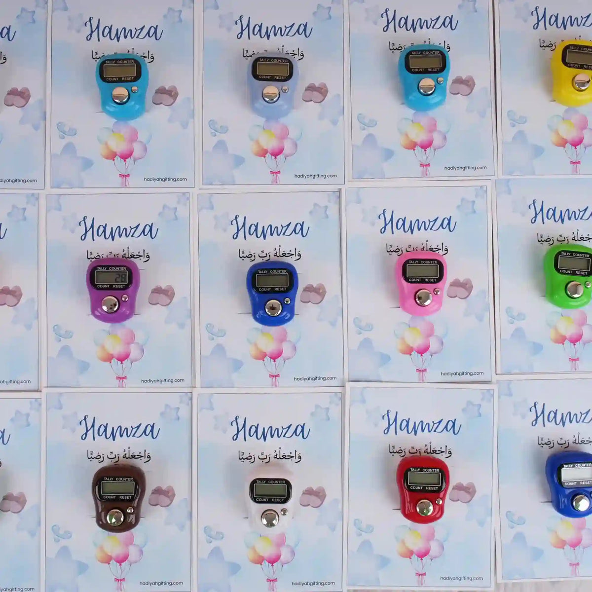 Assorted digital Tasbeeh Favors on Hamza-themed cards, colorful Islamic gifts for Aqiqah or wedding ceremonies, minimum order 50.