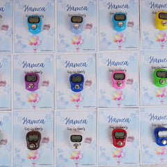 Assorted digital Tasbeeh Favors on Hamza-themed cards, colorful Islamic gifts for Aqiqah or wedding ceremonies, minimum order 50.