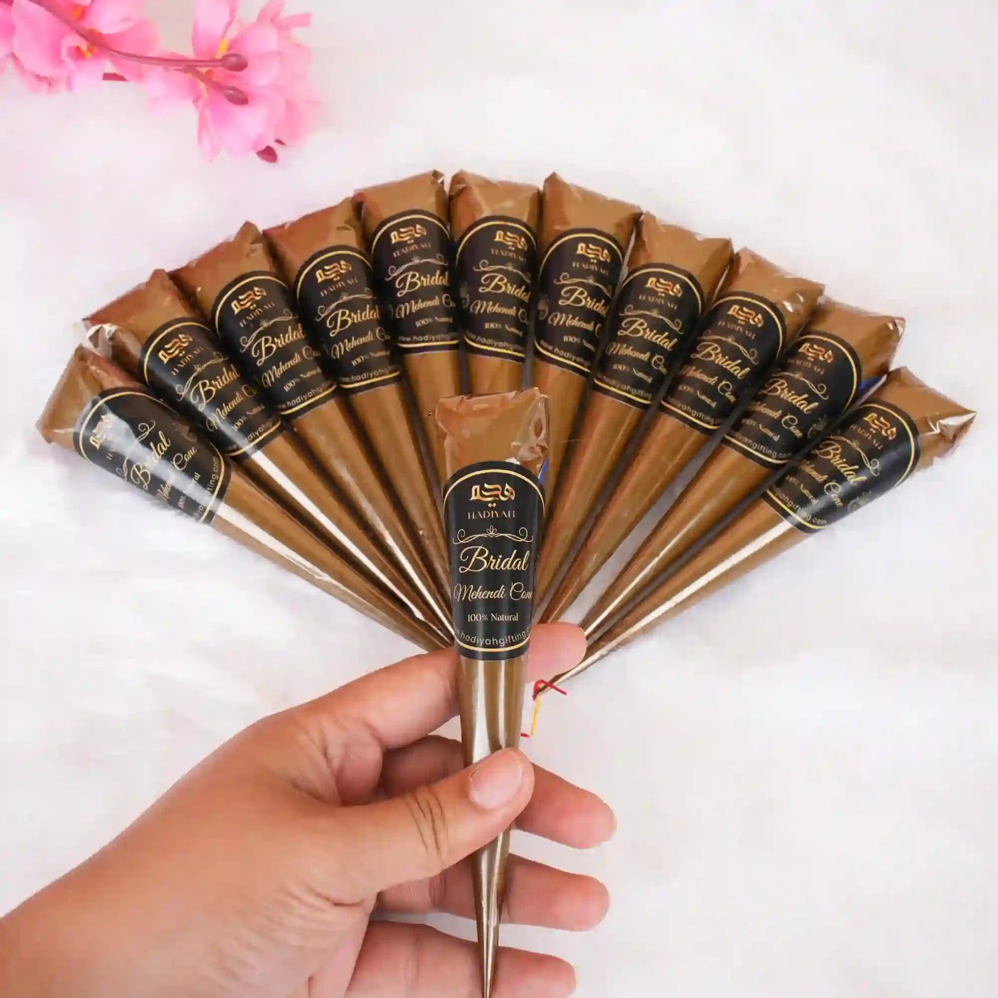 Bridal Mehndi Cones pack of 12 by Hadiyah Gifting, arranged in a fan shape, ideal for weddings and festive celebrations with natural stain. Main image