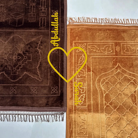 Personalized Couple Janamaz with names and heart motif, featuring soft velvet texture and elegant Islamic patterns for gifting or ceremonial use.