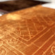 Close-up of golden prayer mat from Couple Janamaz set, showcasing plush velvet texture and intricate Islamic design for serene prayer experience.