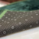 Non-slip dotted backing of Brown & Green Rectangle Janamaz - Couple Prayer Mats Set ensures stability during prayer, ideal for daily use.