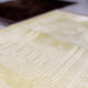 Close-up of offwhite Janamaz from Couple Prayer Mat set showing soft velvet texture and intricate Islamic arch pattern.