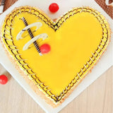 Butterscotch Heart Shape Cake sliced to show the layers inside