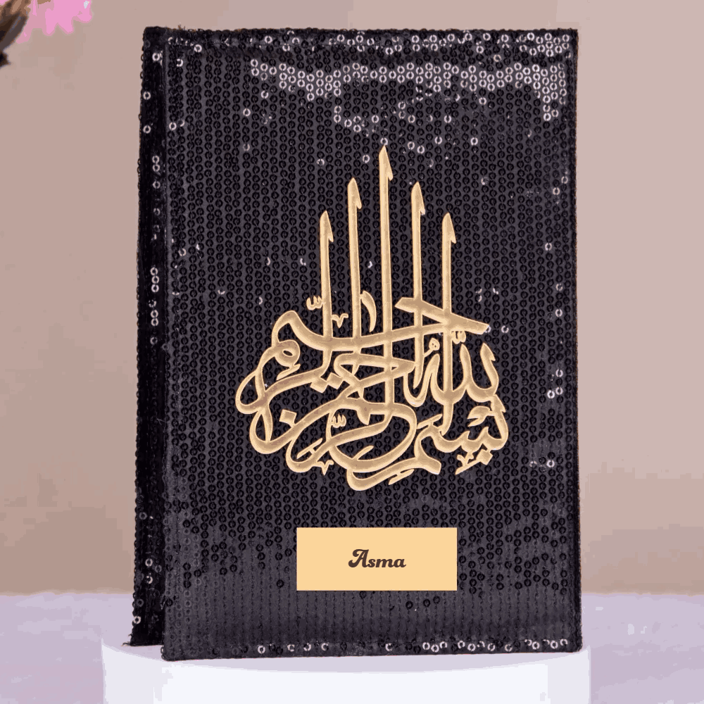 Black sequin Color Coded Arabic Quran with gold Islamic calligraphy and personalized nameplate. Elegant handmade gift Quran from The Bling Collection. Main image