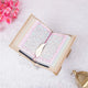 Color-coded Tajweed Quran with gold bookmark, included in the Bridal Gift Hamper - Sawab-e-Jariya for wedding blessings.