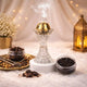 Crystal Dynasty Bakhoor Burner with gold lid releasing aromatic smoke, ideal for Ramadan & EID home decor and gifting occasions.