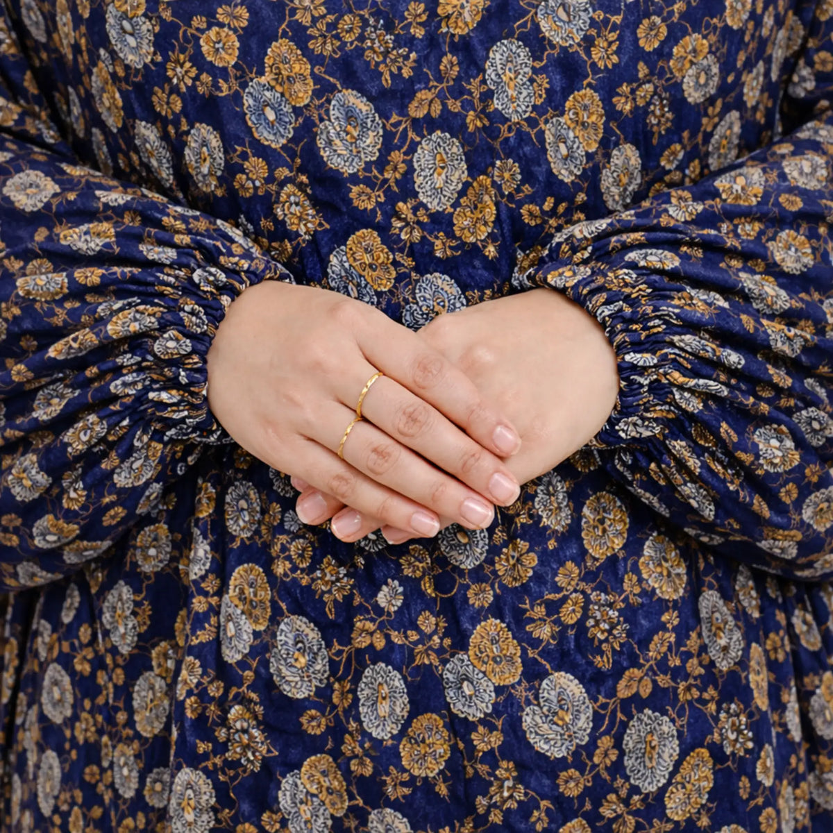 Close-up of Prayer Dress 4's gathered sleeve cuffs and floral pattern, highlighting comfort and detail in modest fashion accessories.