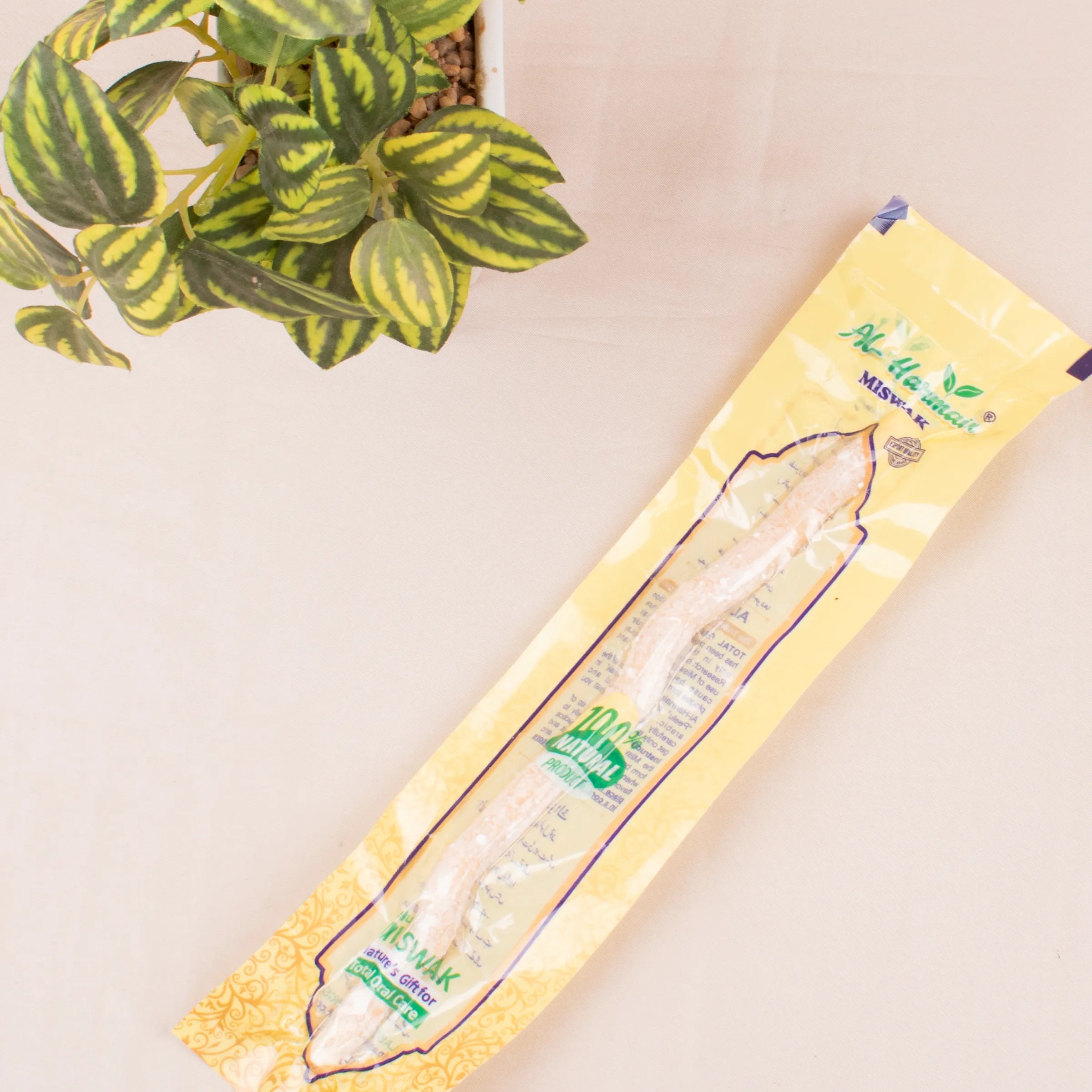 Miswak natural toothbrush in packaging from Raah-e-Makkah Safar Essentials - Luxury Hajj Umrah Hampers, promoting Sunnah oral care.