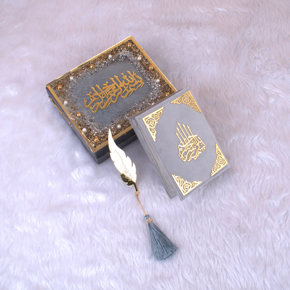 Grey Mini Tilawat-e-Quran velvet box set with gold embellishments and blue tassel bookmark. Elegant handmade Islamic gift box.