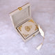 Offwhite Mini Velvet Quran placed inside a plush gift box with gold clasp and feather tassel, perfect for weddings and religious occasions.