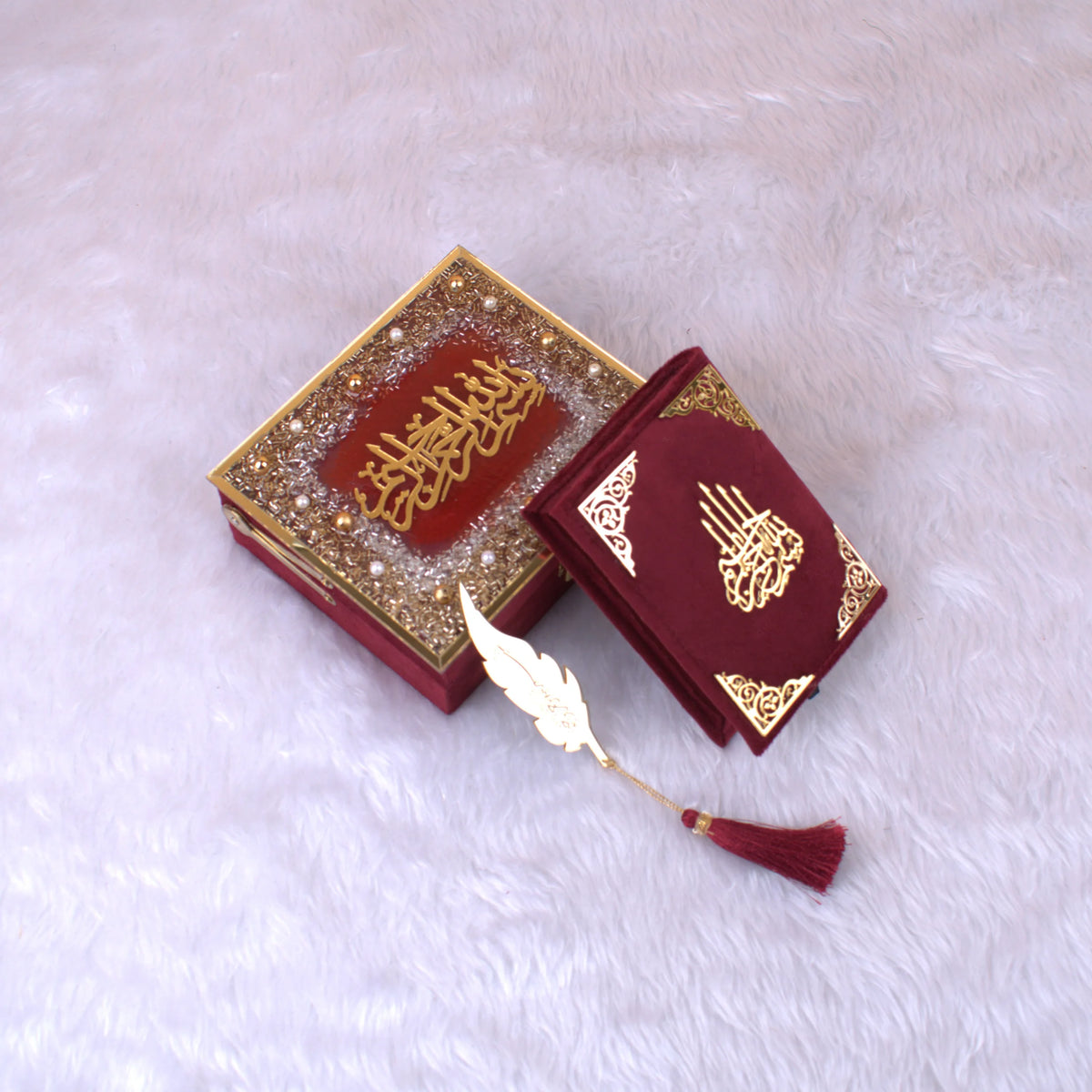 Mini Tilawat-e-Quran in red velvet box with golden Arabic calligraphy and feather bookmark. Handmade Islamic gift set from India.