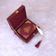 Compact Maroon Mini Velvet Quran placed inside a matching velvet box with gold detailing and tassel bookmark. Elegant gift for special occasions.