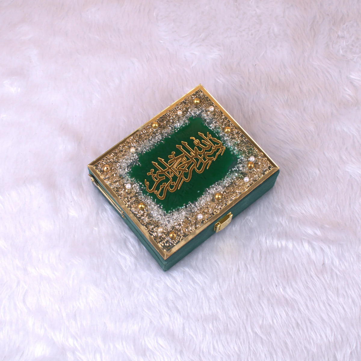Closed velvet Quran gift box with pearl and sequin embellishments, housing Green Sequence Mini Tilawat Quran, handmade in India.