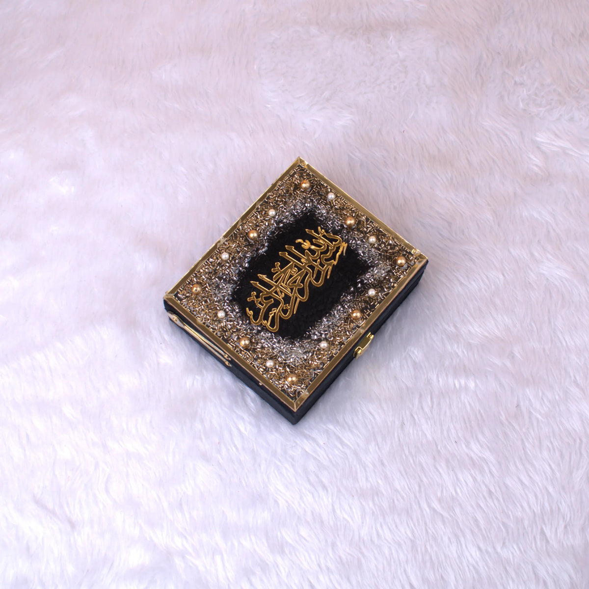 Closed handmade designer box from the Black Sequence Mini Quran Velvet Set, adorned with pearls and gold Arabic script, ideal for ceremonial gifting.
