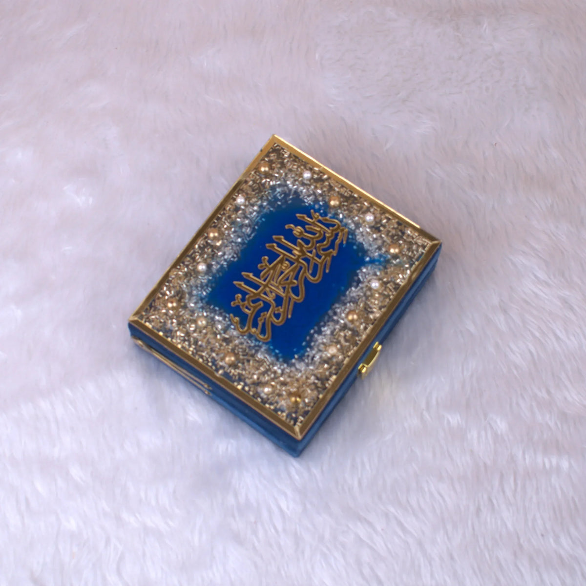 Blue Sequence Mini Tilawat-e-Quran in a closed embellished velvet box with gold Arabic calligraphy, perfect for bridal or religious gifts.