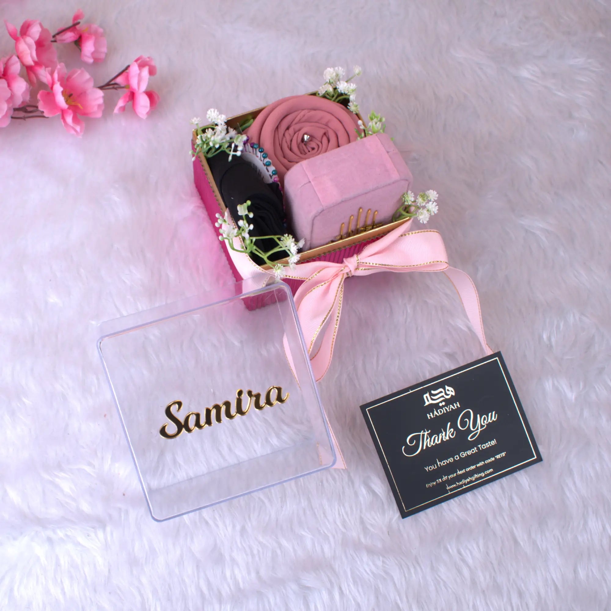 Pink Hijab Combo gift box with personalized name 'Samira', featuring a pink chiffon hijab, cap, designer pin, and accessories for women. Main image