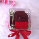 Top view of Red Hijab Combo featuring rolled chiffon hijab, red velvet box, and colorful pins arranged in a clear personalized box.