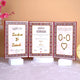 Detailed view of A4 Nikah Nama from Maroon Majestic Essential Nikah Hamper with Islamic verses and bride-groom names for wedding documentation.