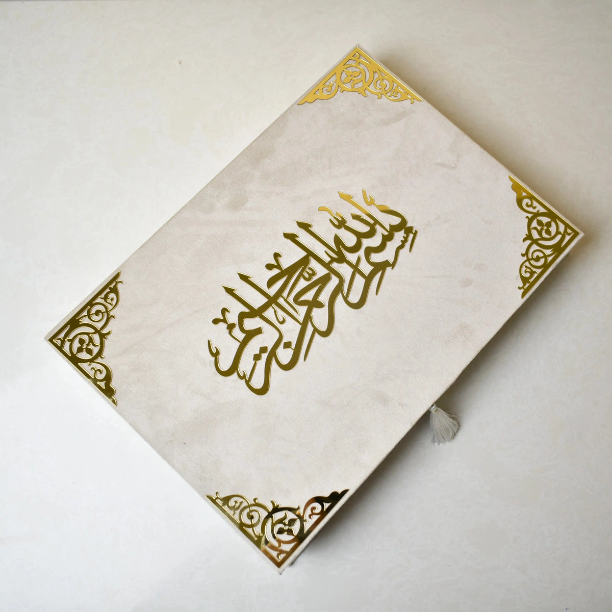 Offwhite Islamic hamper with devotional essentials and gourmet chocolates presented in a sophisticated A3 designer gift box