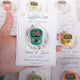 Close-up of green digital Tasbeeh card favor for Nikah, personalized with couple's names and date. Blends tradition with tech for Islamic weddings.