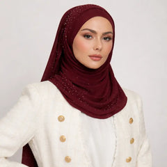 Deep red studded Hijab styled on a model, showcasing its smooth texture and elegant drape for modest fashion wear.