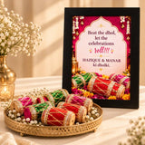 Miniature dholki celebration wedding frame with colourful drums and floral design
