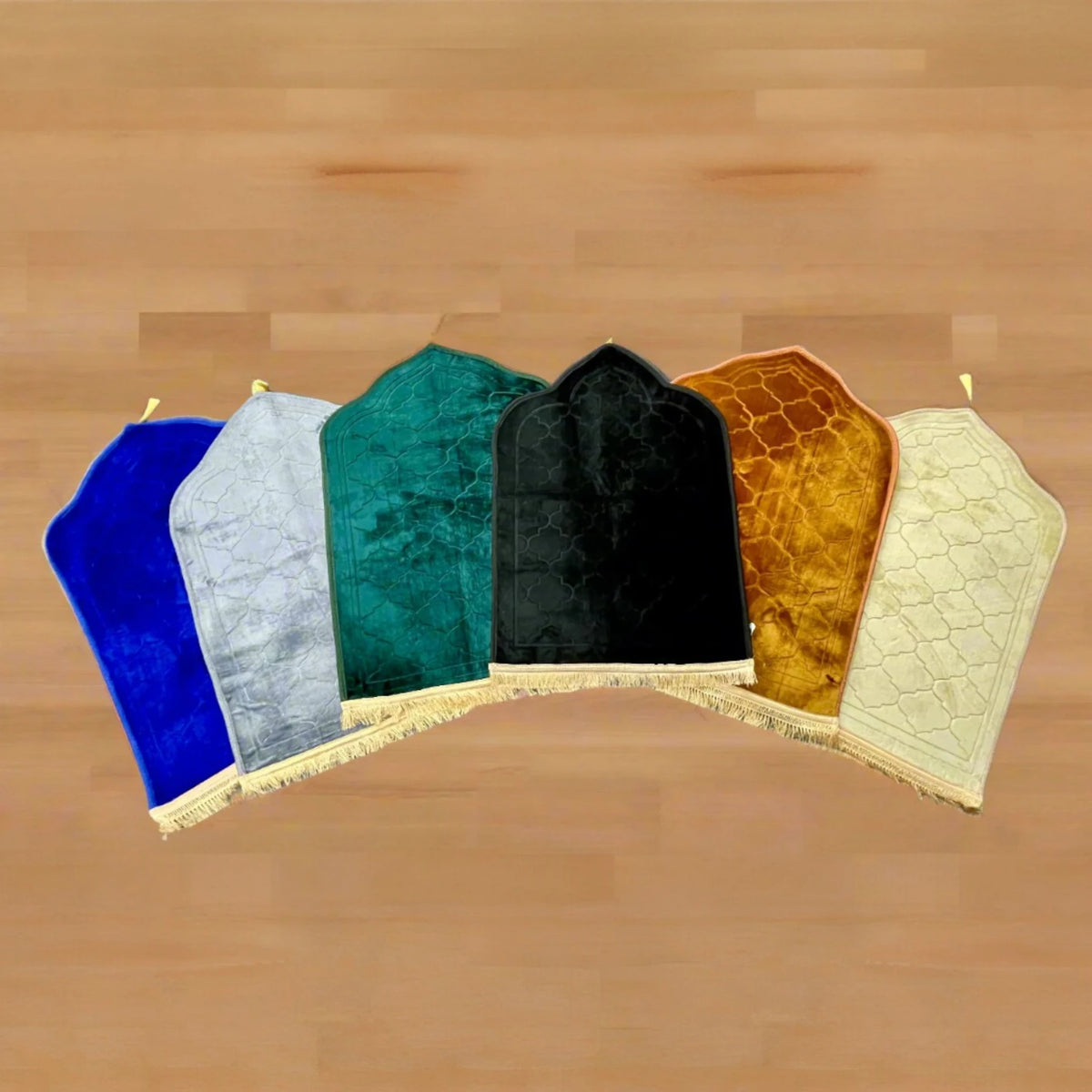 Collection of dome-shaped Janamaz in multiple colors including blue, grey, green, black, gold, and cream. Great for gifting and personalization.