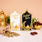 Elegant white and black Sadaqah Box set with gold Islamic motifs, ideal for Ramadan gifts and home decor in the Religious Items category.