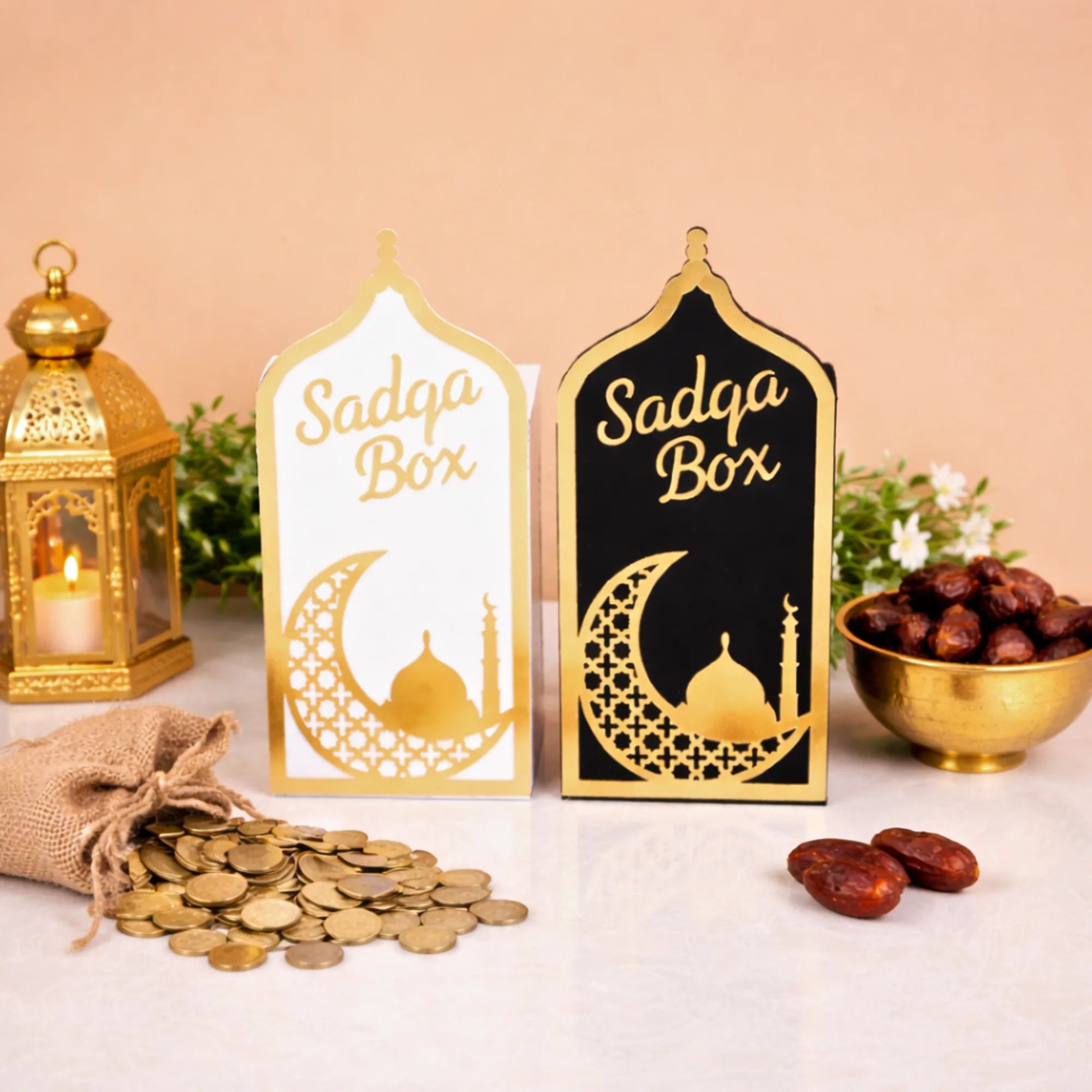 Elegant white and black Sadaqah Box set with gold Islamic motifs, ideal for Ramadan gifts and home decor in the Religious Items category. Main image