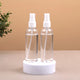 Travel Spray Bottle - Pack of 2 - Essential for Travel, shown upright on a white stand with clear liquid, ideal for Hajj or Umrah use.