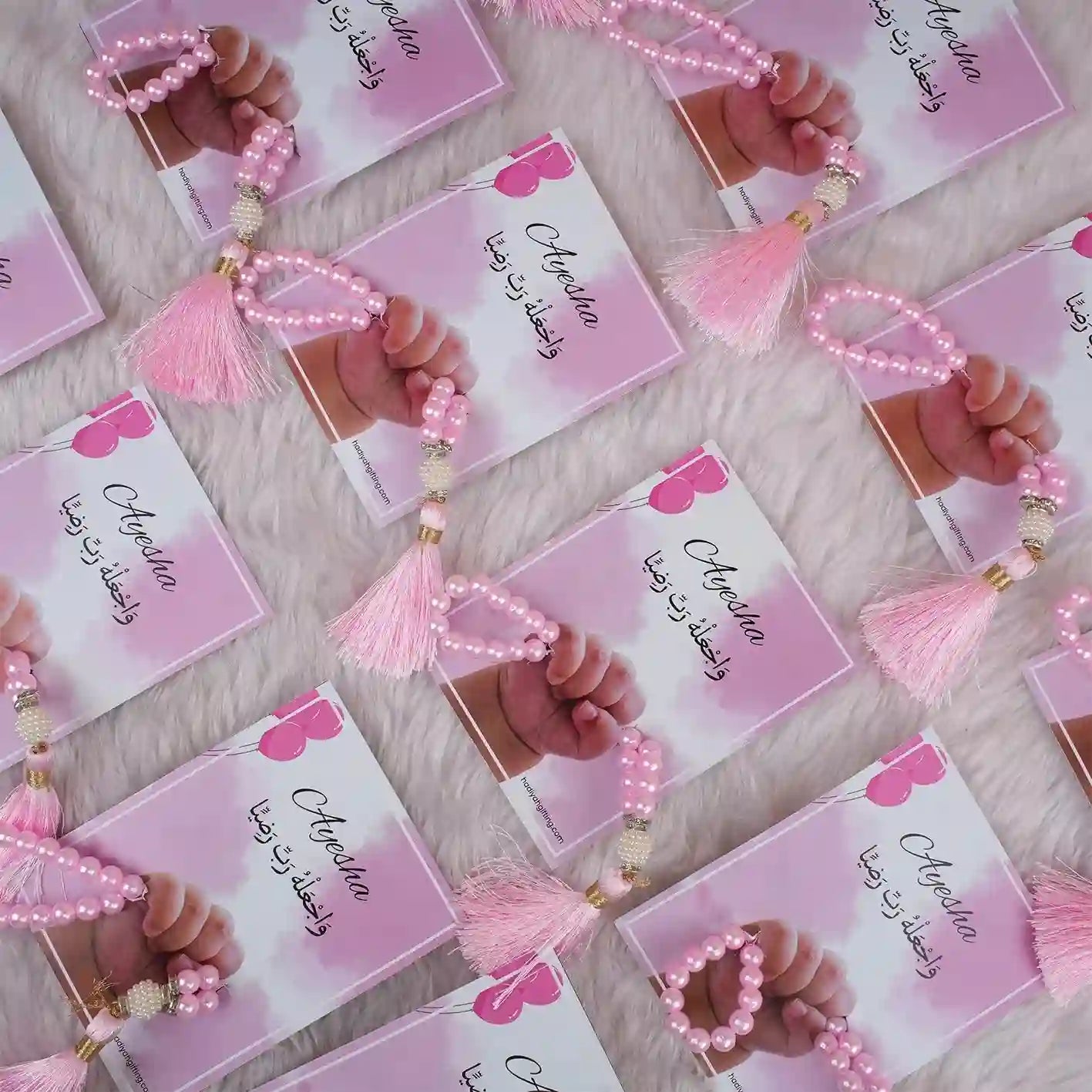 Little Hands Tasbeeh Keepsake in pink with personalized cards, ideal Aqiqah wedding favors for girls in the Religious Prayer Beads category. Main image