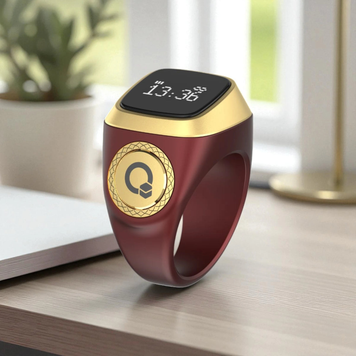 Maroon and gold Zikr Ring smart tasbeeh with digital prayer counter and OLED screen, ideal for Hajj and Umrah gifts.