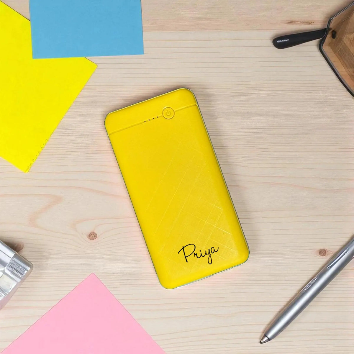 Yellow EnWing 10K mAh Powerbank - Portable 10000 mAh featuring name 'Priya', vibrant and compact charger for daily electronic use.