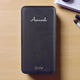 Black EnZest Powerbank 10000mAh with custom name 'Avinash', featuring a textured finish and sleek design for tech users.