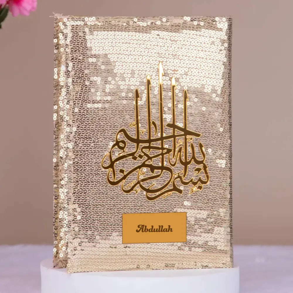 English Quran - Bling Collection in gold sequin cover with custom nameplate 'Abdullah'. Elegant gift Quran for special occasions and prayer. Main image