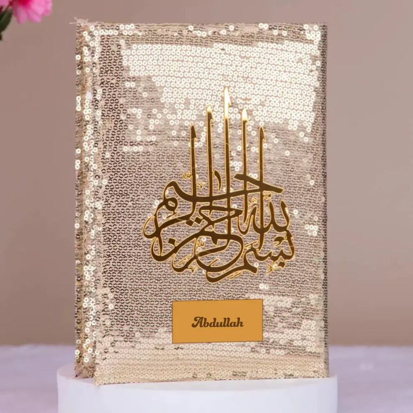 English Quran - Bling Collection in gold sequin cover with custom nameplate 'Abdullah'. Elegant gift Quran for special occasions and prayer. Main image