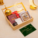 Gift basket with religious items and a 'Ramadan Mubarak' card on a beige background